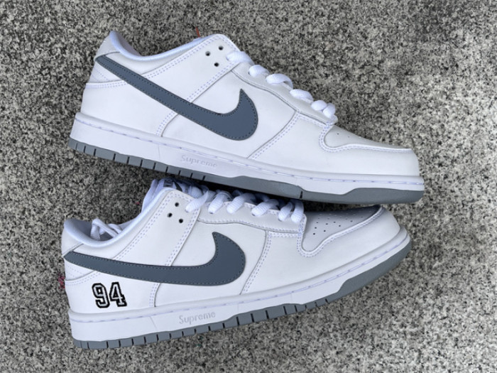 S*prem* x Nike SB Dunk Low White / Metallic Silver-White HQ8487-100